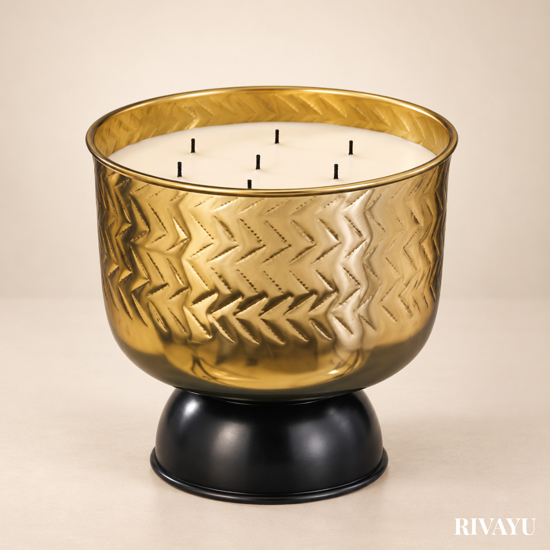 Gold chevron-embossed multi-wick soy wax candle with black pedestal base, luxury home decor